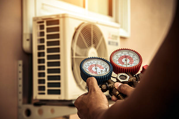 Professional Air Conditioning Service technician working in Irvington, NJ